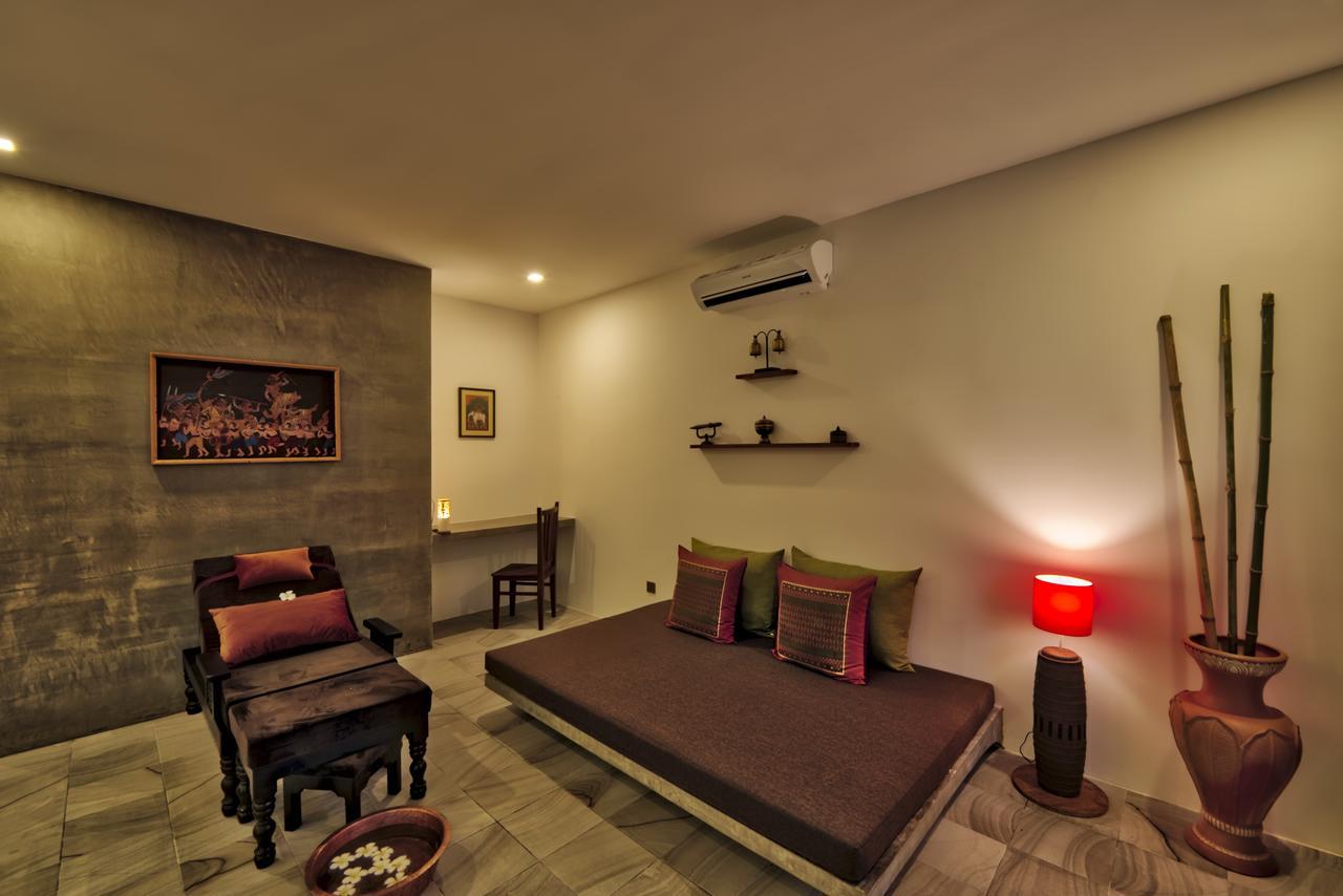 Mane Village Suites Siem Reap Exterior photo A room at the spa