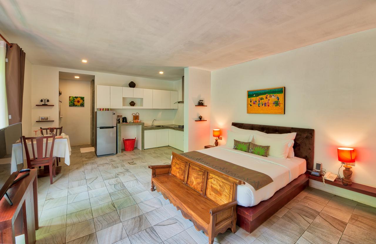 Mane Village Suites Siem Reap Exterior photo A studio apartment