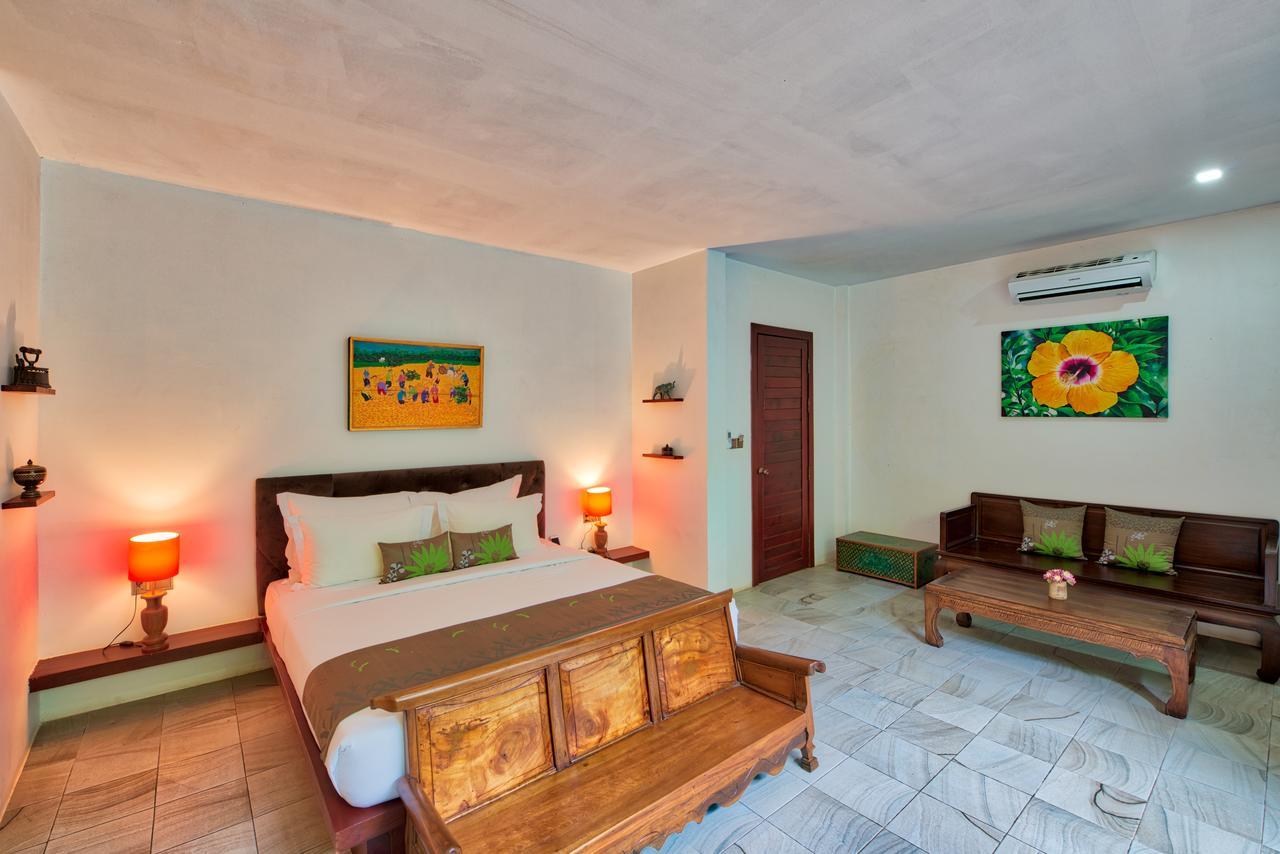 Mane Village Suites Siem Reap Exterior photo Deluxe Room