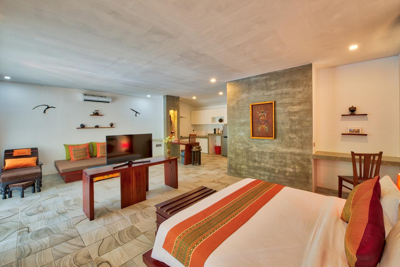 Mane Village Suites Siem Reap Exterior photo A room at the hotel